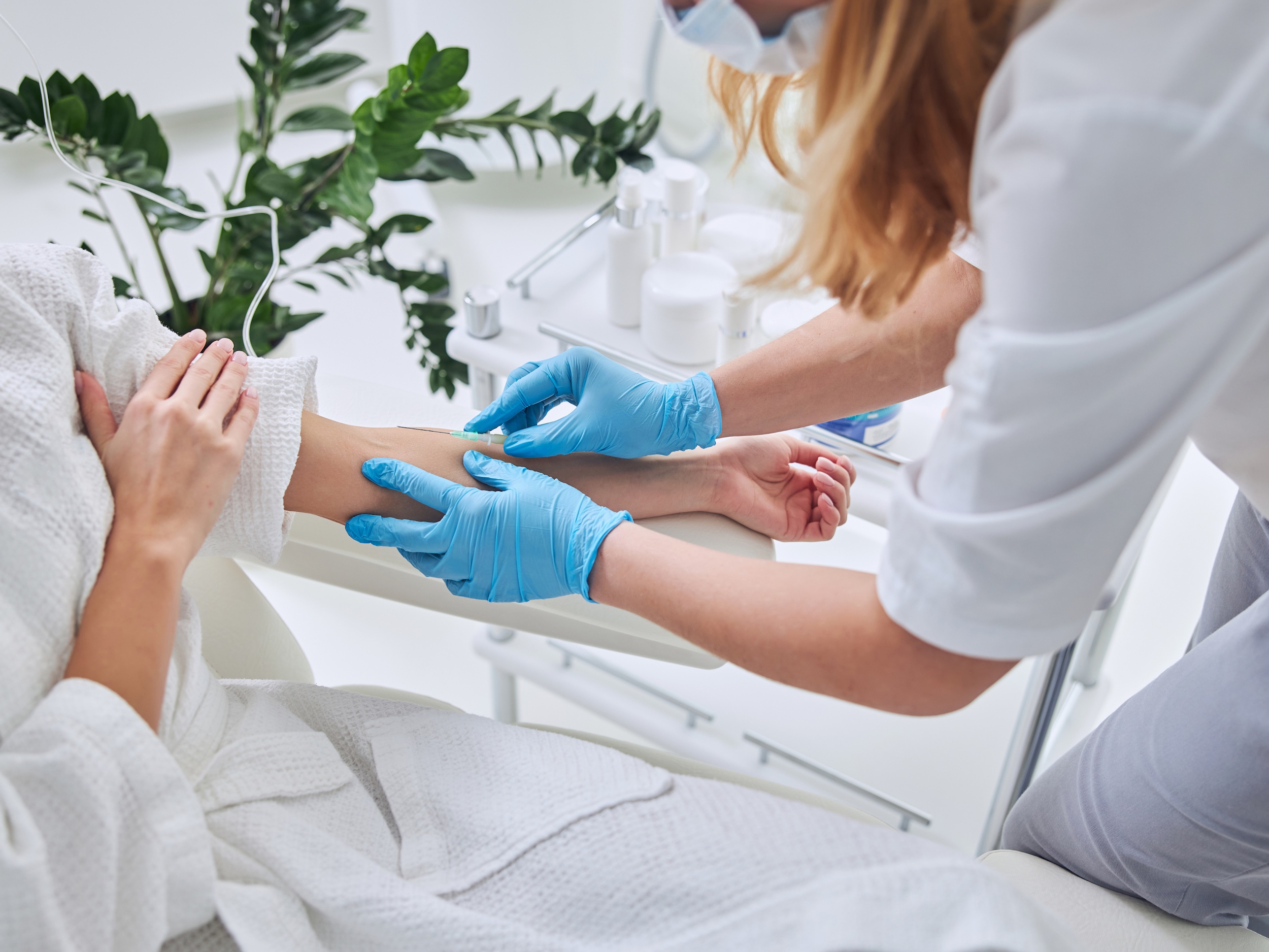 Close up of woman getting IV treatment in Omaha