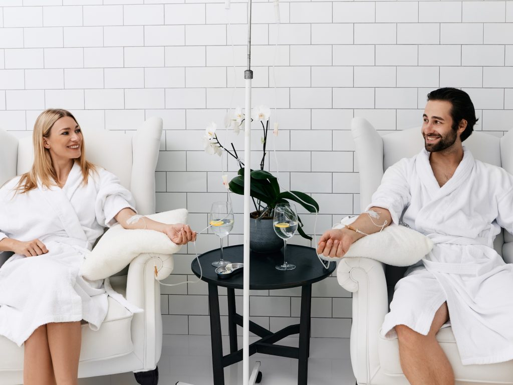Couple receiving IV drip treatment in Omaha